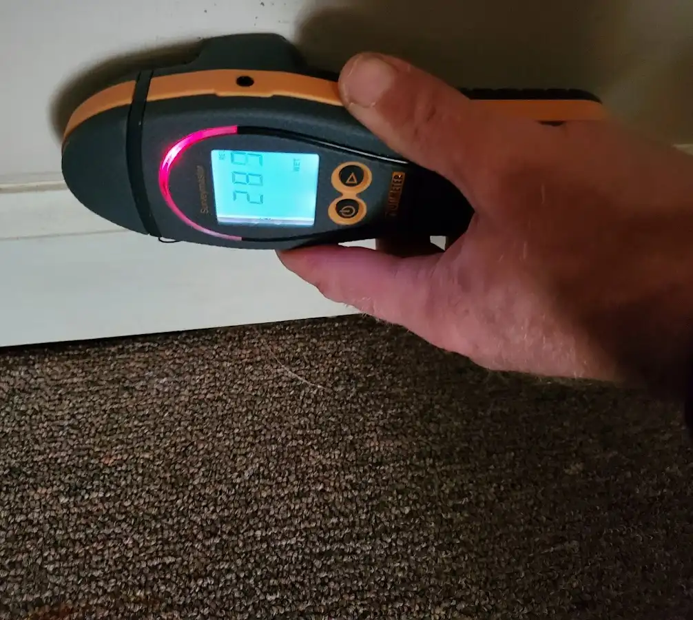 Moisture detection at baseboard during Sewage Cleanup & Sanitation in Lauderhill